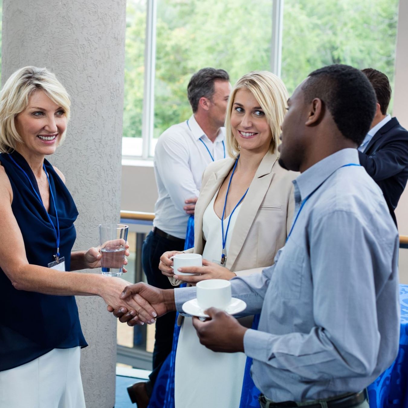 People networking at business event